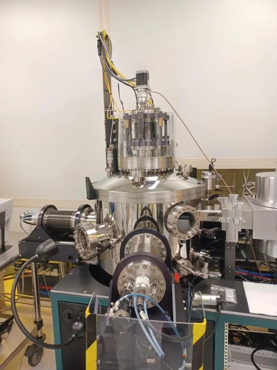 A CVD laboratory chamber with vacuum ports, cabling, and instrumentation